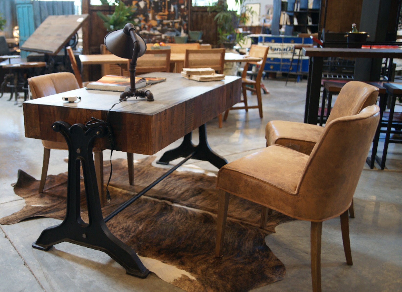 HTD Home Trends Design Austin Showroom showcasing the Aspen Bedroom Collection in the newest Smoked Acacia finish.